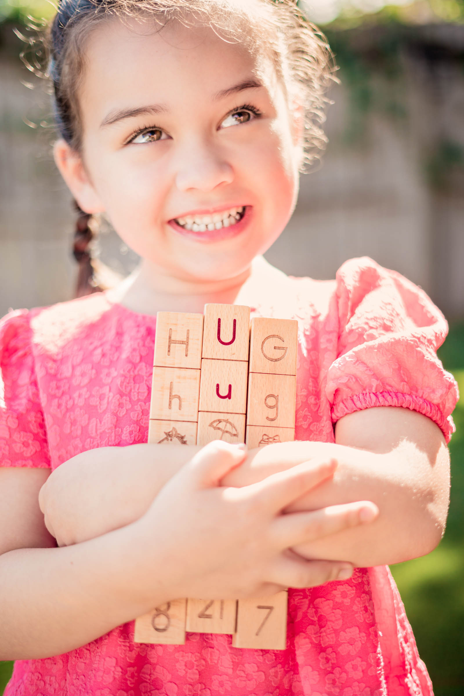 Wooden Polyblox Totems spelling hug